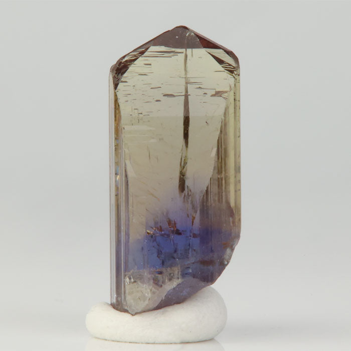 transparent zoisite crystal with natural color zoning