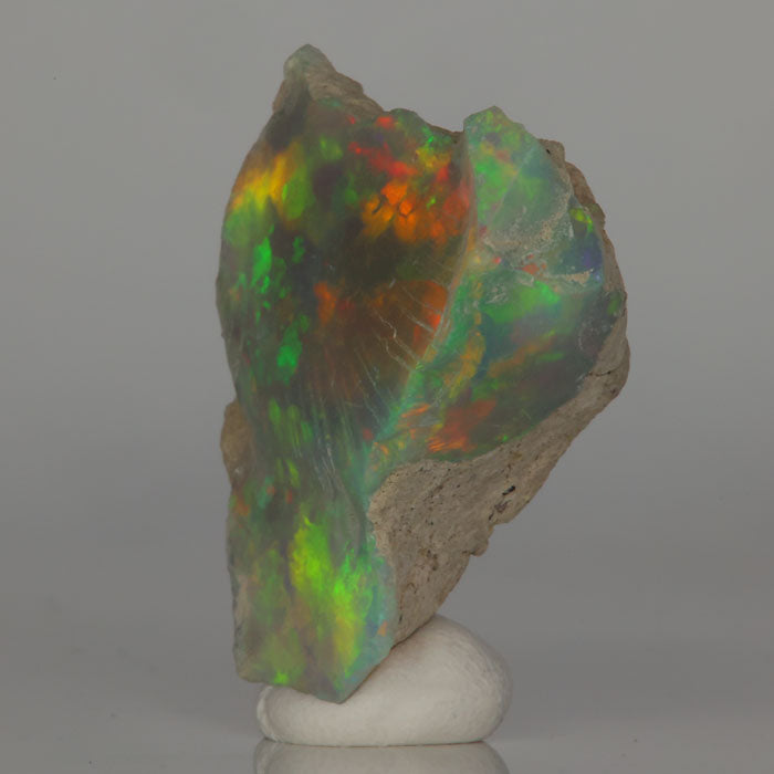 hydrophane opal specimen with matrix and vivid color