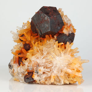 Dark metallic crystals believed to be oxidized pyrite on quartz from Hekou China