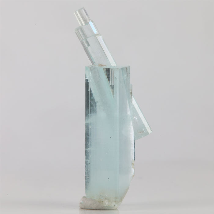Front view of 9.66 gram aquamarine specimen displaying multiple naturally terminated crystals growing at different angles.