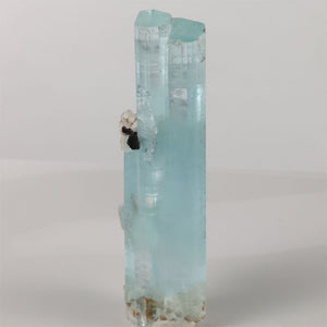 Natural 51.50 gram aquamarine specimen showing transparent hexagonal terminations and a small side crystal.