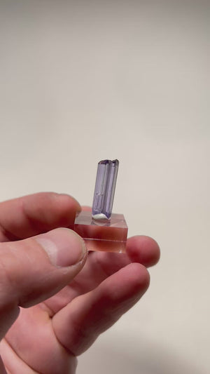 Tanzanite crystal specimen showing natural termination and light inclusions
