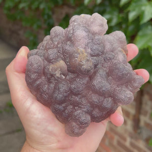 Natural fluorite display specimen showing deep lavender color