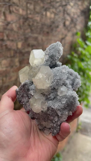 translucent-calcite-crystals-on-matrix