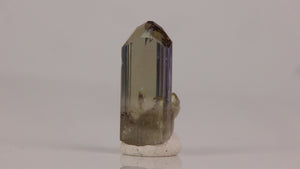 Natural zoisite crystal with violet blue and golden tones unheated tanzanite