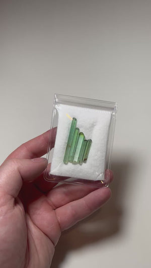 natural green tourmaline crystal group from africa vertical striations