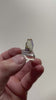 transparent zoisite crystal with patchy violet coloration