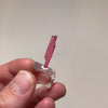 Thin ribbon-like Rhodonite with vivid pink color