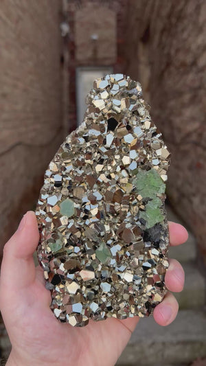 metallic pyrite crystal cluster with fluorite