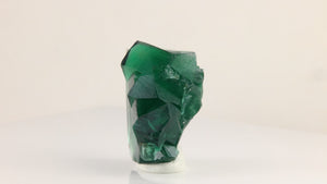 Close-up of Rogerley fluorite crystals featuring rich green color, layered surface textures, and excellent crystal definition.