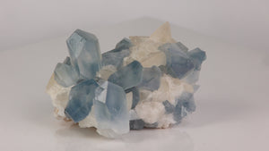 sky blue celestite with calcite crystals
