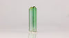 slender green tourmaline crystal pair with similar size