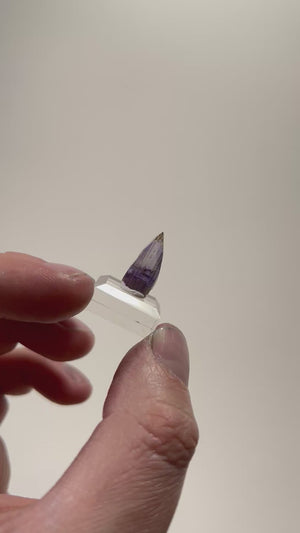 transparent zoisite crystal with natural color zoning