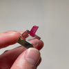 Small Brazilian Rhodonite crystal on display mount