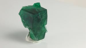 Close-up of 36.12 gram Rogerley fluorite crystal specimen with well-defined cubic growth, transparent areas, and deep green coloration.