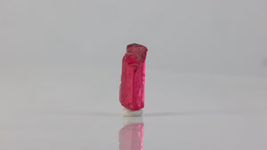 bright rhodonite thumbnail specimen with translucent structure