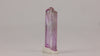 Light pink zoisite crystal with natural termination and transparency