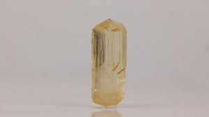 Tectosilicate scapolite crystal with warm color and clean crystal habit