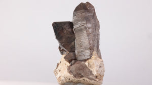 Smoky Quartz Crystal Cluster on Feldspar