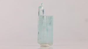 Reverse view of Pakistani aquamarine showing transparent hexagonal faces and a distinctive branching crystal formation.