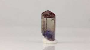 golden and violet blue tanzanite crystal specimen