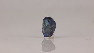 Blue zoisite crystal rough with internal banding and natural inclusions
