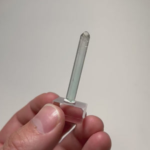 Elongated blue Tourmaline crystal specimen