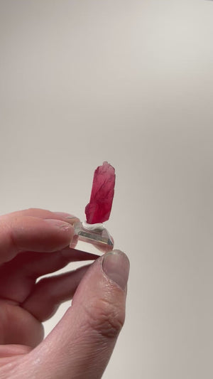 natural brazil rhodonite specimen with tall sculptural form
