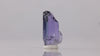 Raw natural tanzanite crystal specimen blue and purple
