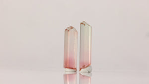elongated tourmaline crystals with peach and pink hues