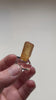 Brazilian topaz specimen with warm orange hues and broad crystal face