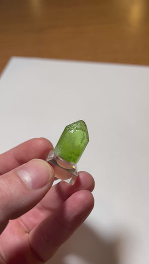 Natural peridot crystal thick green specimen with good color