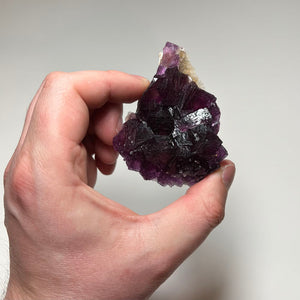 cubic fluorite crystals deep violet mineral specimen