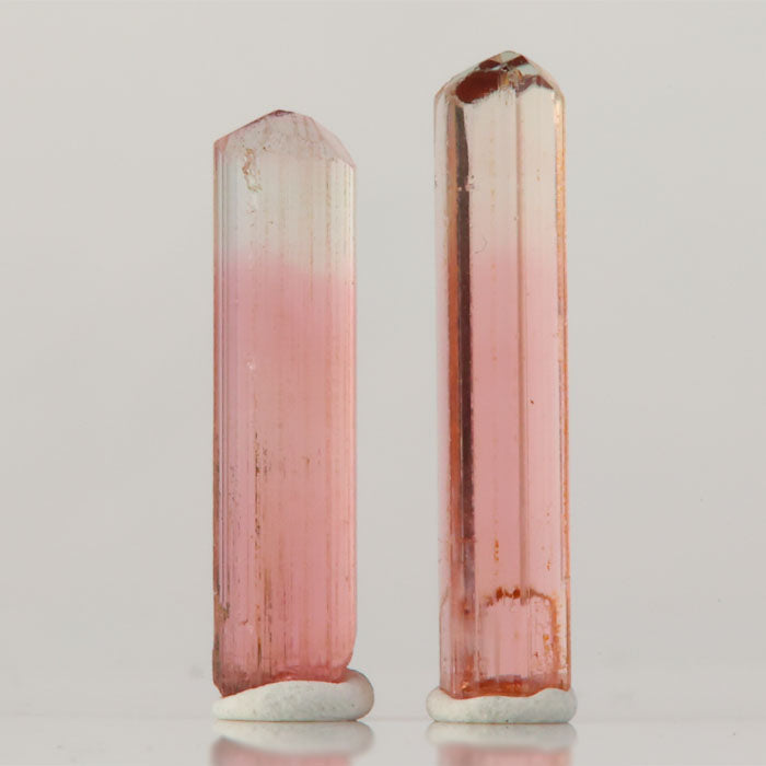 small tourmaline crystal pair soft pink tones collector display