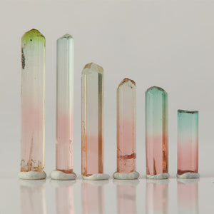 raw bi color tourmaline crystals set natural gemstone specimen group
