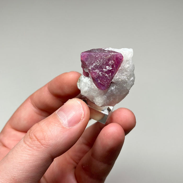 pink spinel crystal in white matrix specimen