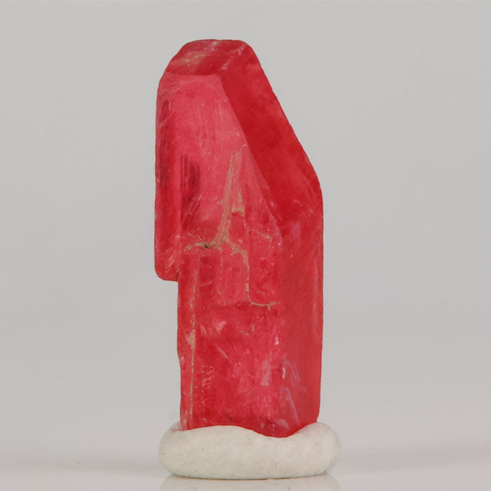 Natural rhodonite specimen with compact form and saturated pink tone