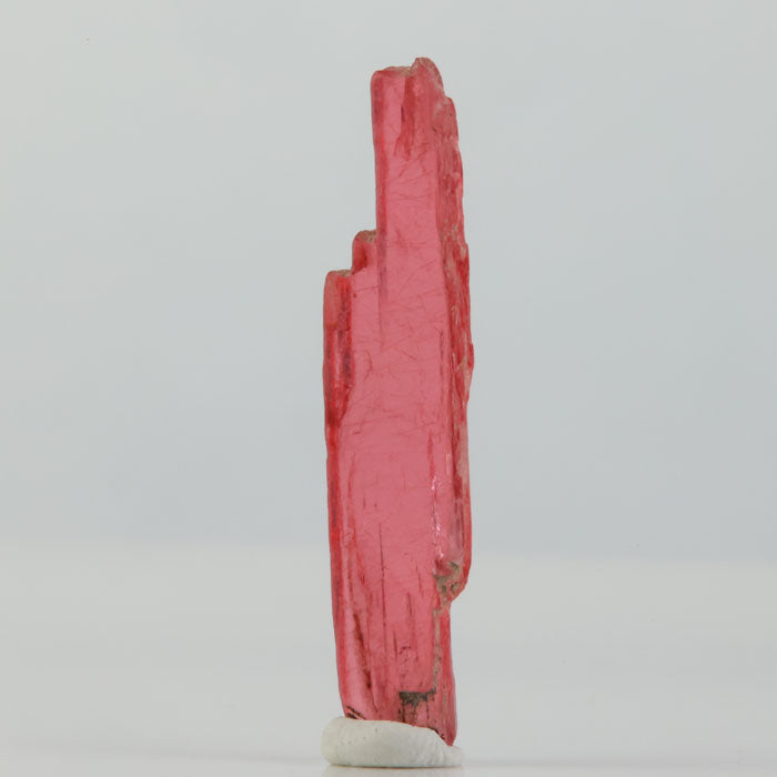 Natural Rhodonite blade displaying strong transparency