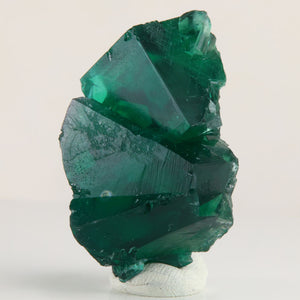 Deep emerald-green Rogerley fluorite crystal cluster weighing 40.05 grams with overlapping cubic crystals and sharp geometric faces.