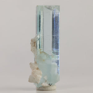 Reverse view of natural aquamarine from Skardu Valley displaying vertical striations and a sharply formed crystal termination.