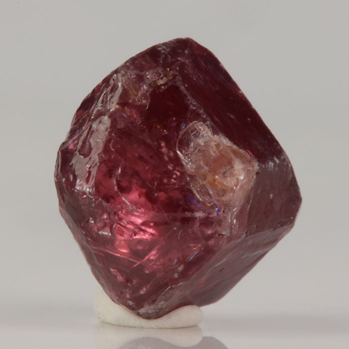 Zircon crystal specimen with compact structure and color variation