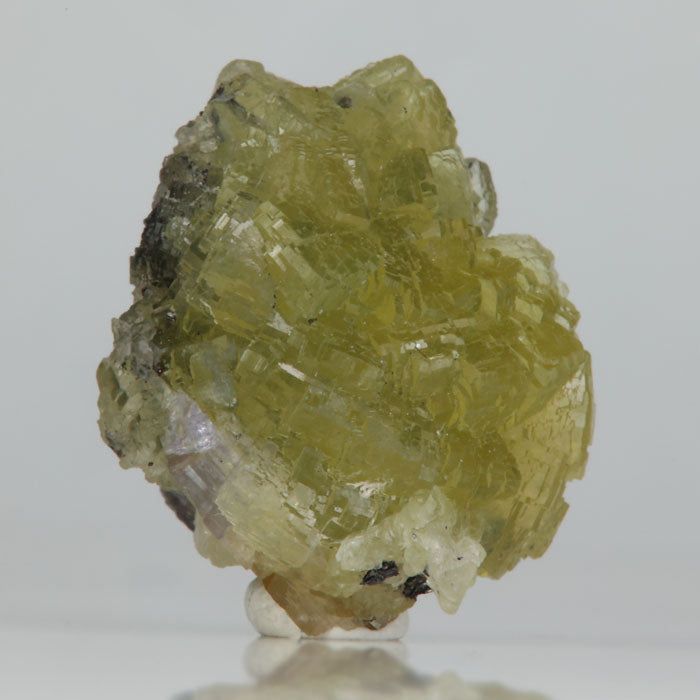 Mineral specimen featuring Prehnite and Tanzanite