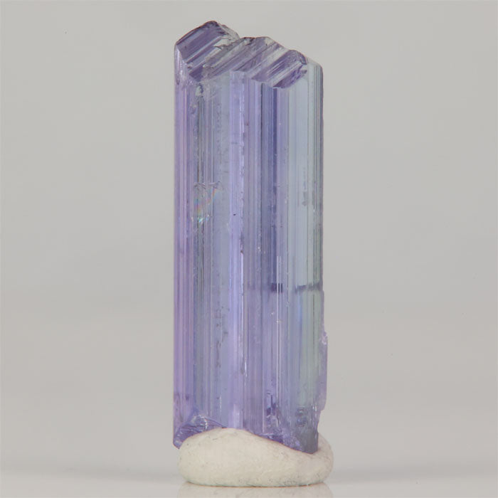 Tanzanite crystal specimen showing natural termination and light inclusions