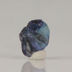 Blue zoisite crystal rough with internal banding and natural inclusions