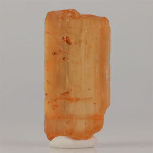 Topaz crystal with translucent body and visible internal inclusions
