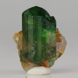 green tourmaline crystal with prismatic form