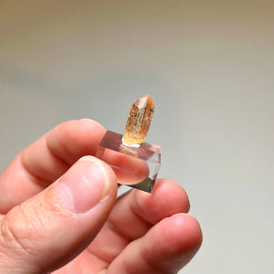 Transparent peach-orange Chrome Topaz specimen
