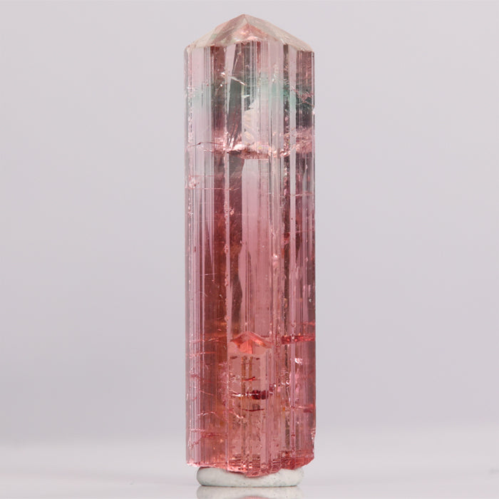 Peachy pink tourmaline crysta fades