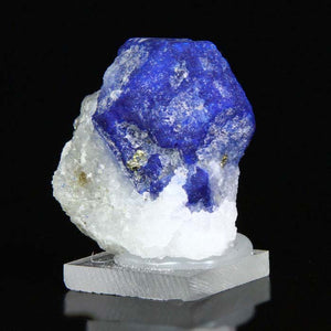 Lazurite crystal on calcite with pyrite