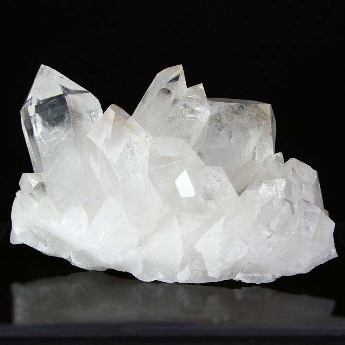 Raw quartz crystal cluster specimen